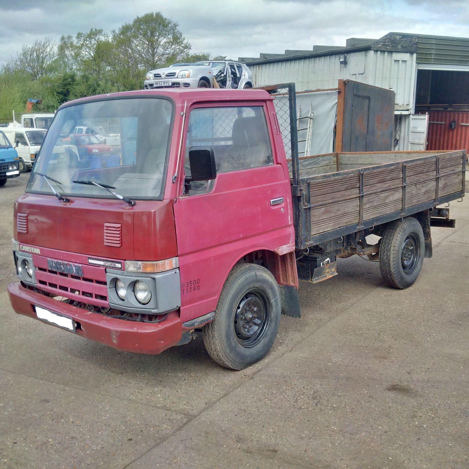 Left hand drive Nissan Cabstar TD25 2.5 D pick up truck. Simply Exports